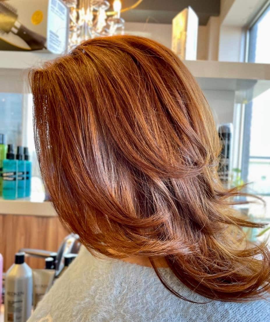 13. Feathered Layers in Copper Red - Layered Hairstyles