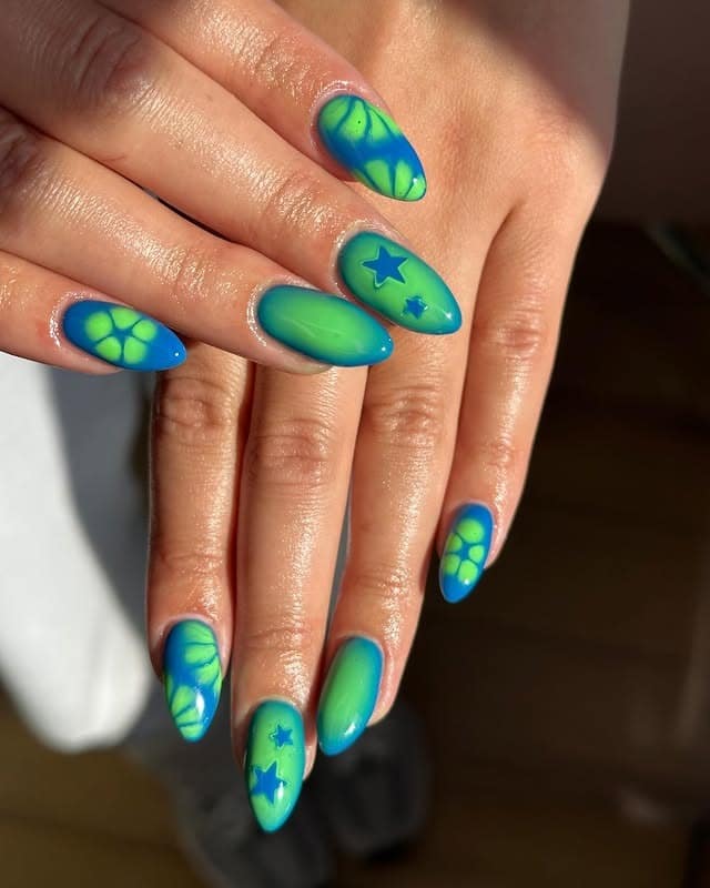 5. Starry Gradient Glow Nails - blue and green nail ideas