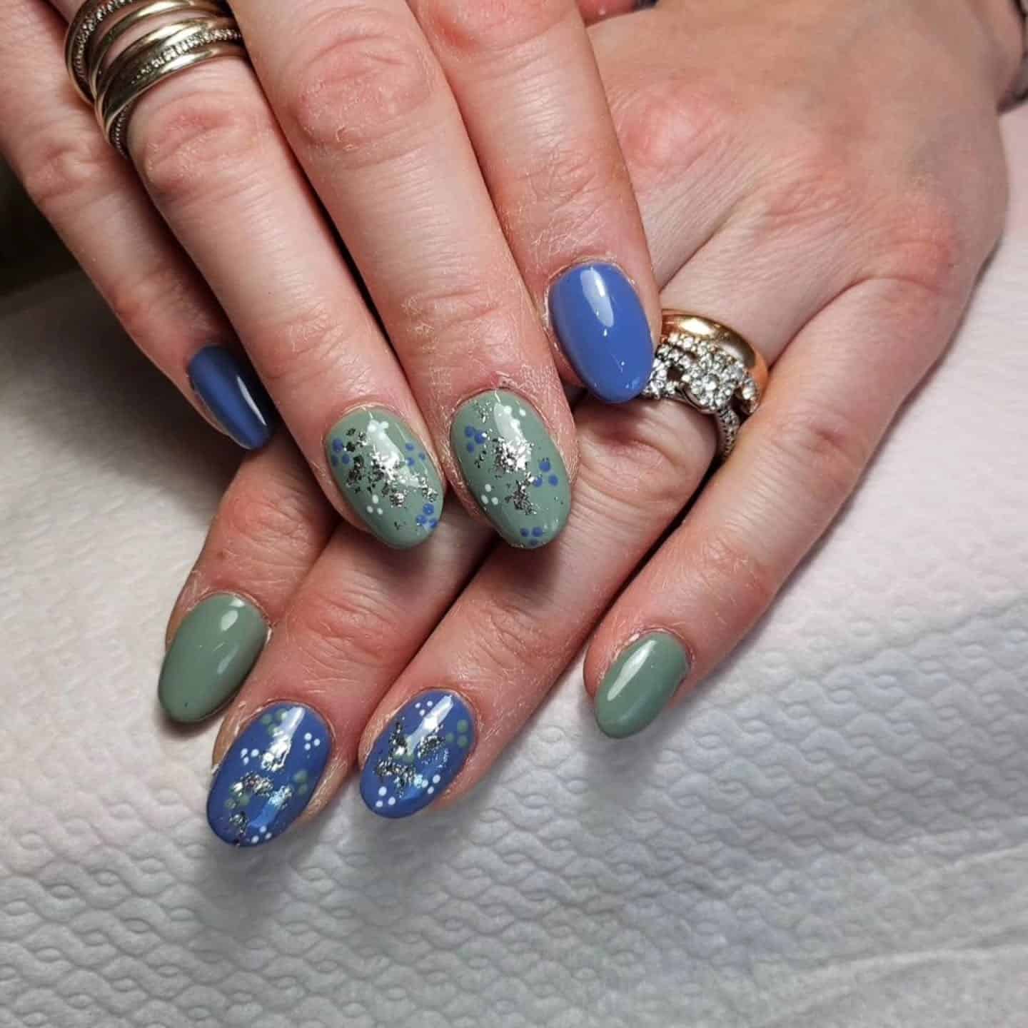 17. Sparkle Accent Short Nails - blue and green nail ideas