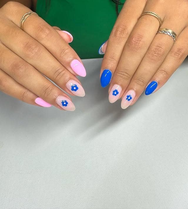 7. Blue Floral Accent Almond Nails - blue and pink nail ideas