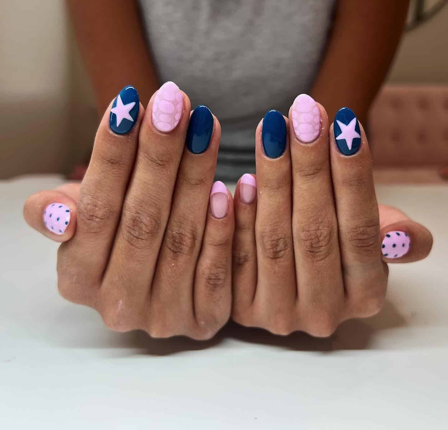 21. Playful Stars and Polka Dots - blue and pink nail ideas