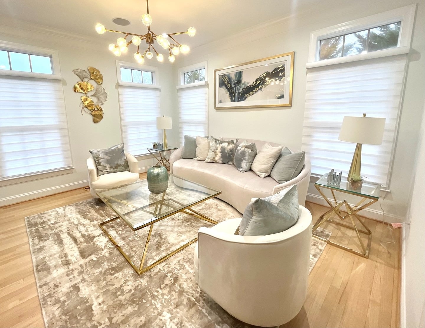 8. Soft Luxury with Curved Silhouettes - white and gold living room ideas