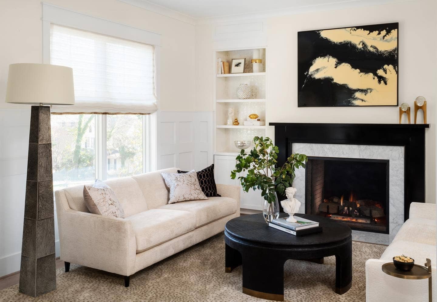 10. Contemporary Minimalism with Black and Gold Contrast - white and gold living room ideas