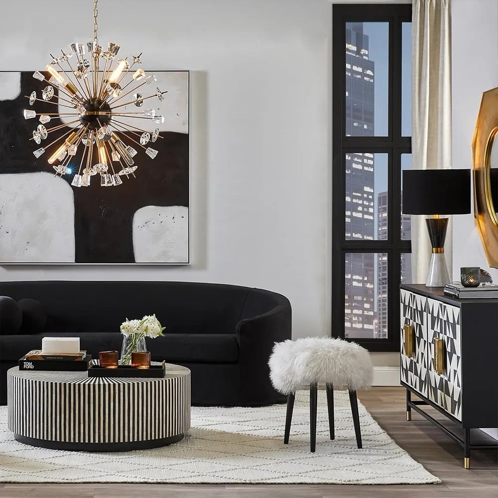 22. Modern Black and White with Gold Statement Lighting - white and gold living room ideas