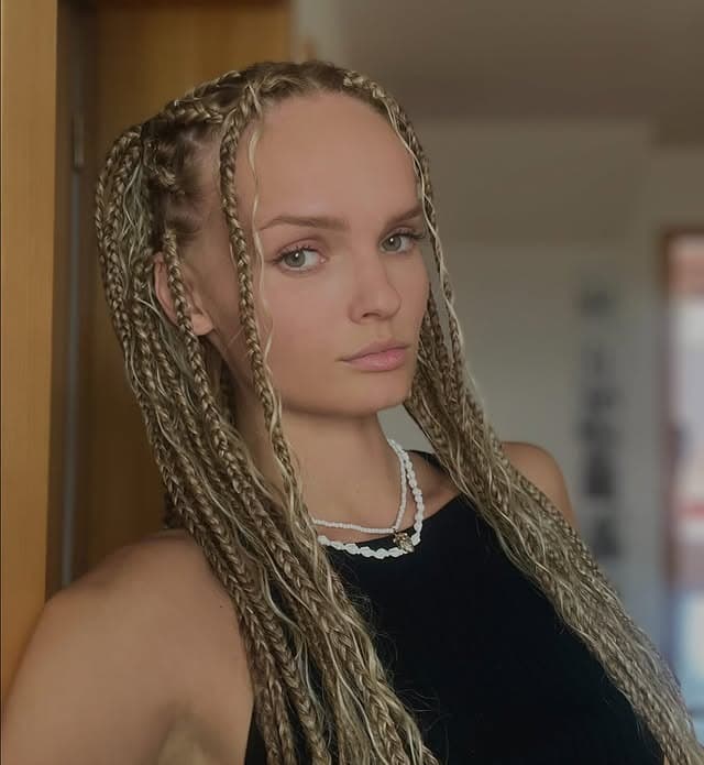 10. Long Blonde Twists with Defined Parting - Braided Hairstyles