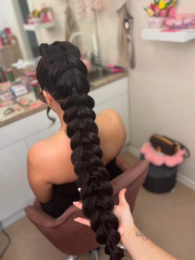 14. Voluminous Bubble Braid on Jet Black Hair - Braided Hairstyles