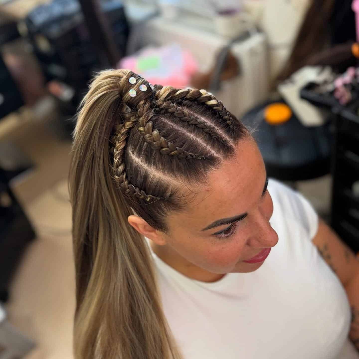 22. High Ponytail with Cornrow Accents on Honey Blonde Hair - Braided Hairstyles