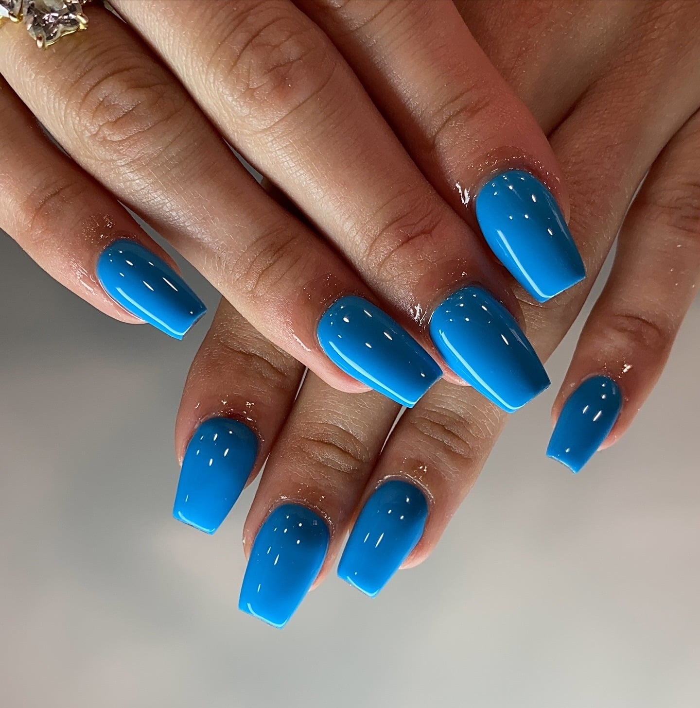 13. Electric Blue Short Coffin Nails - blue coffin nail ideas