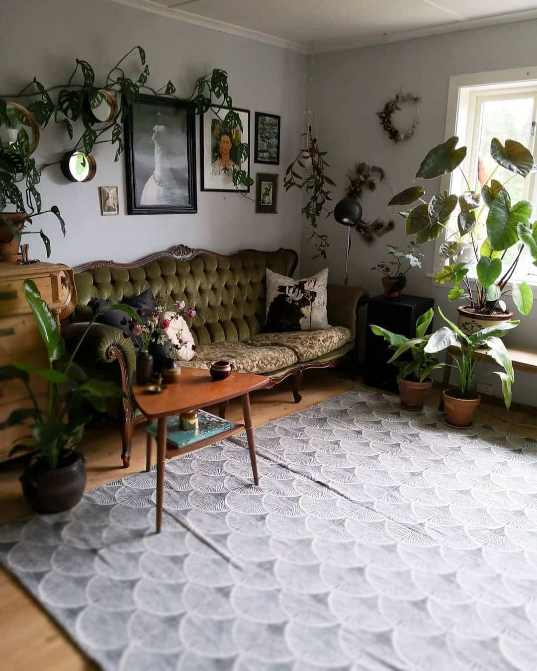 1. Vintage Charm with Olive Green - living room ideas with indoor plants