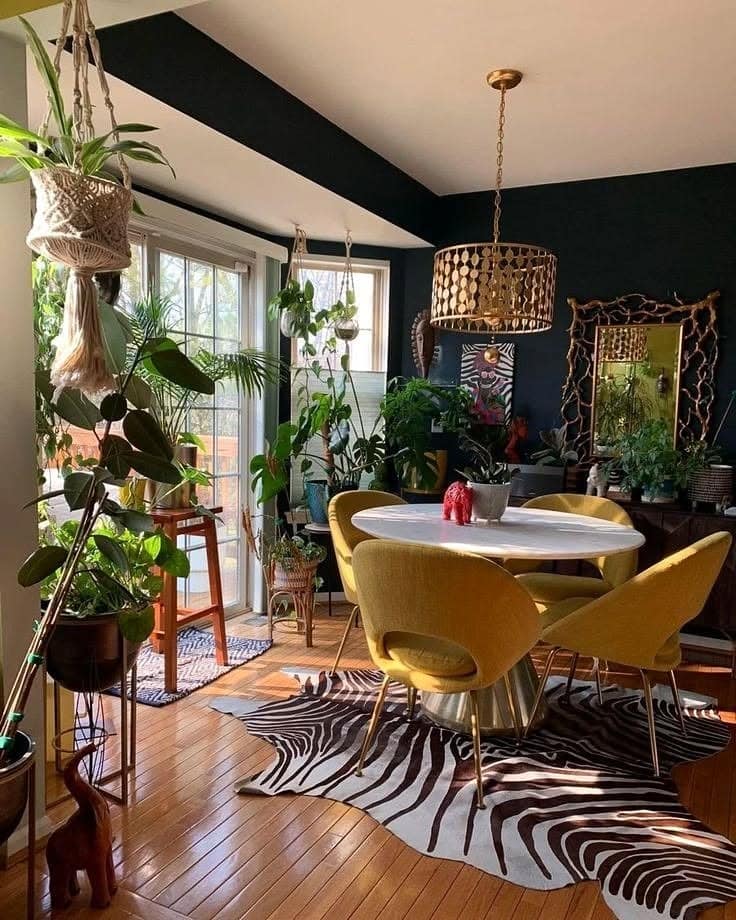 3. Sunlit Dining with Tropical Touches - living room ideas with indoor plants
