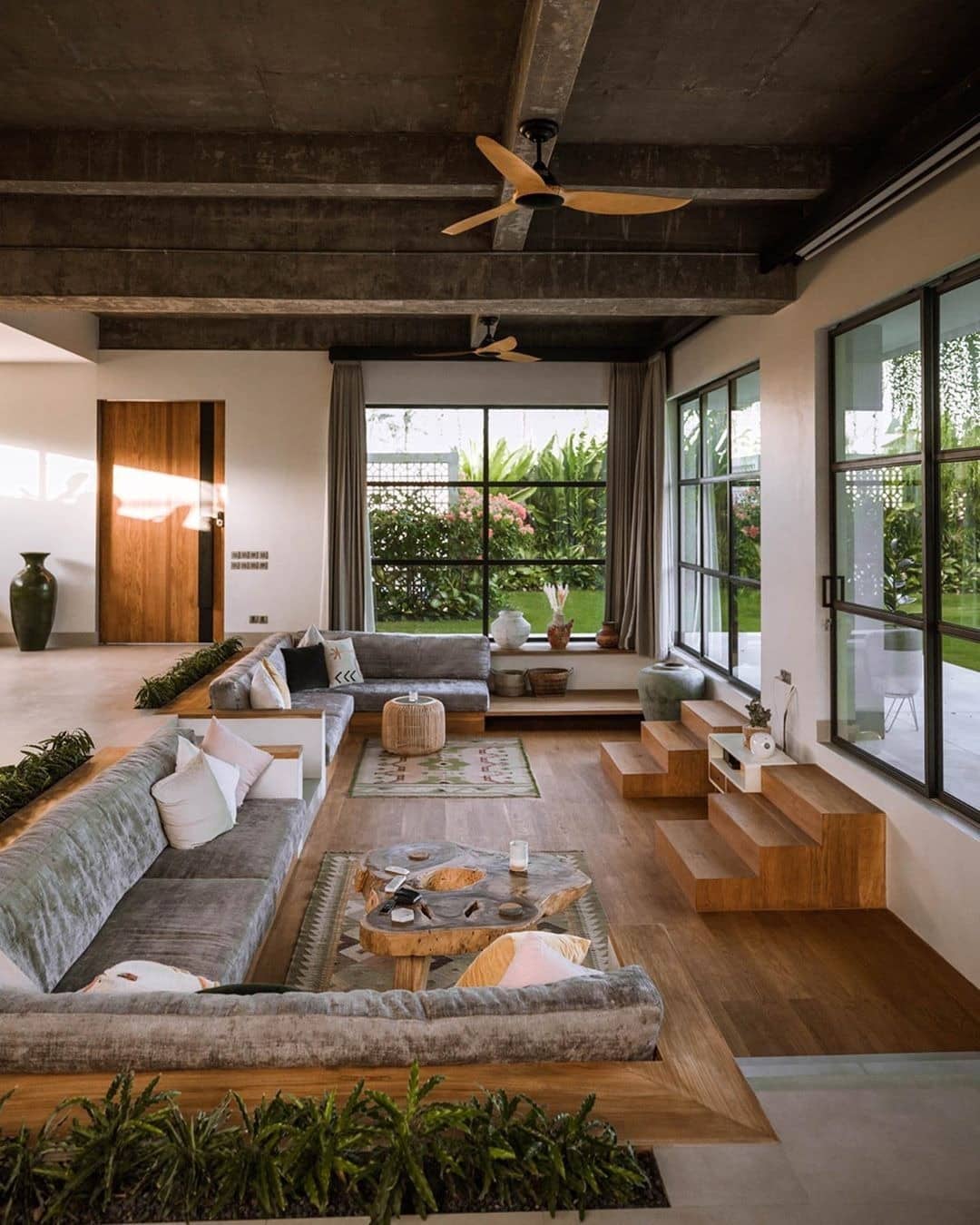 12. Sunken Comfort with Natural Light - living room ideas with indoor plants
