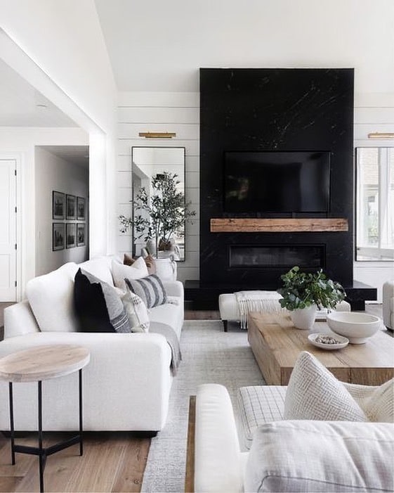 15. Monochrome Contrast with Green Accents - living room ideas with indoor plants