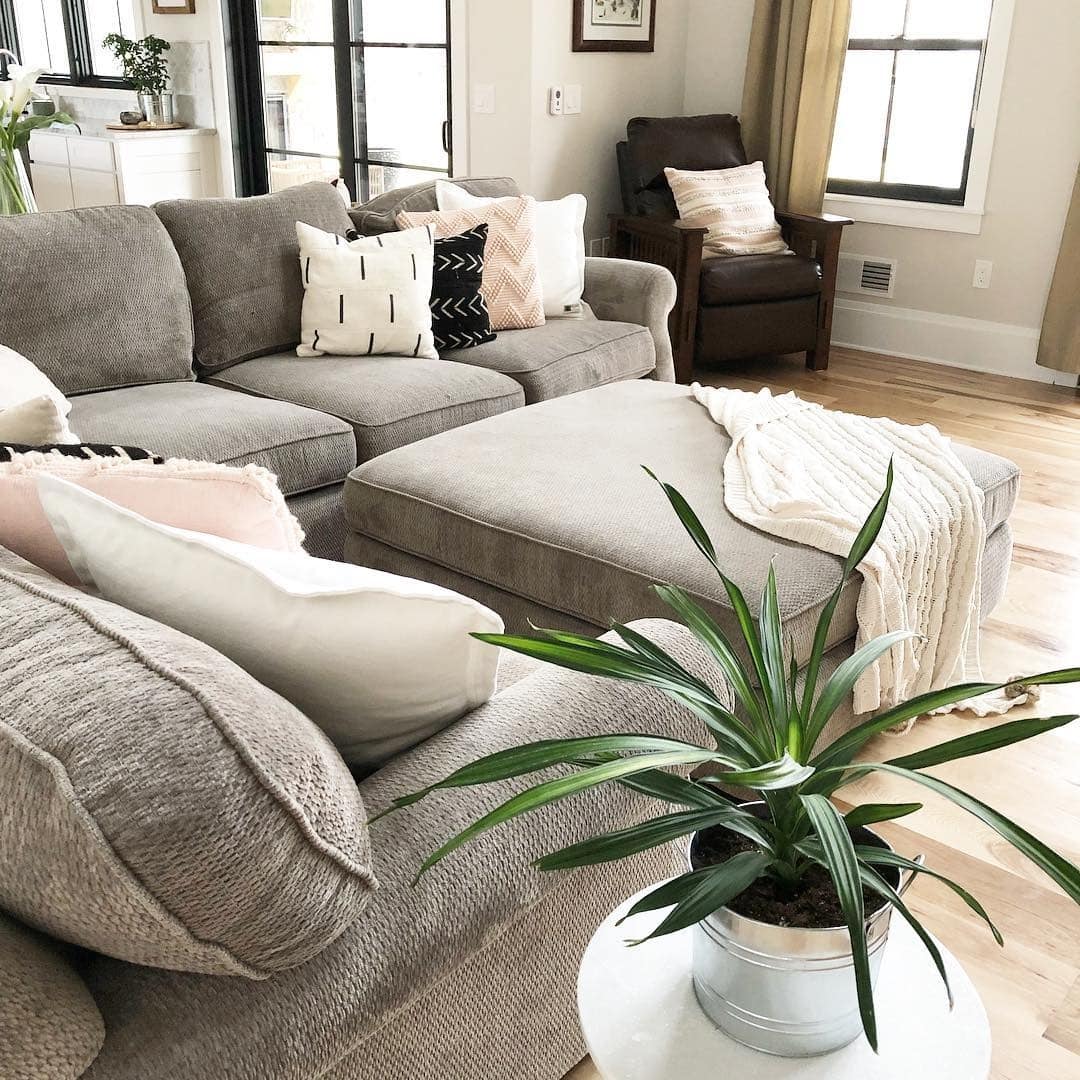 21. Soft Neutrals with Cozy Layers - living room ideas with indoor plants