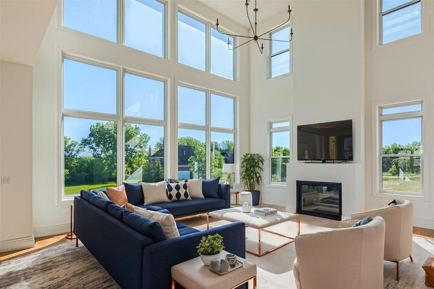 15. Grand Windows with Coastal Contrast - light living room ideas