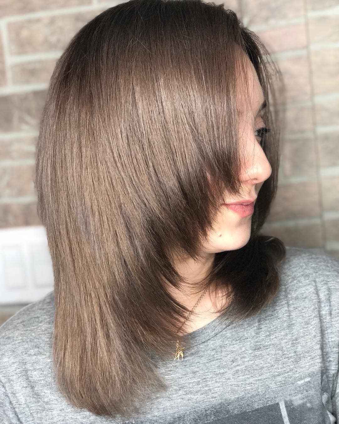 13. Ashy Light Brown Layers - Warm Brown Hair Color