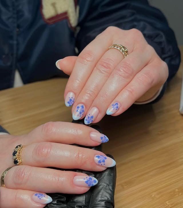 2. Pastel Petal Fade - blue floral nail ideas