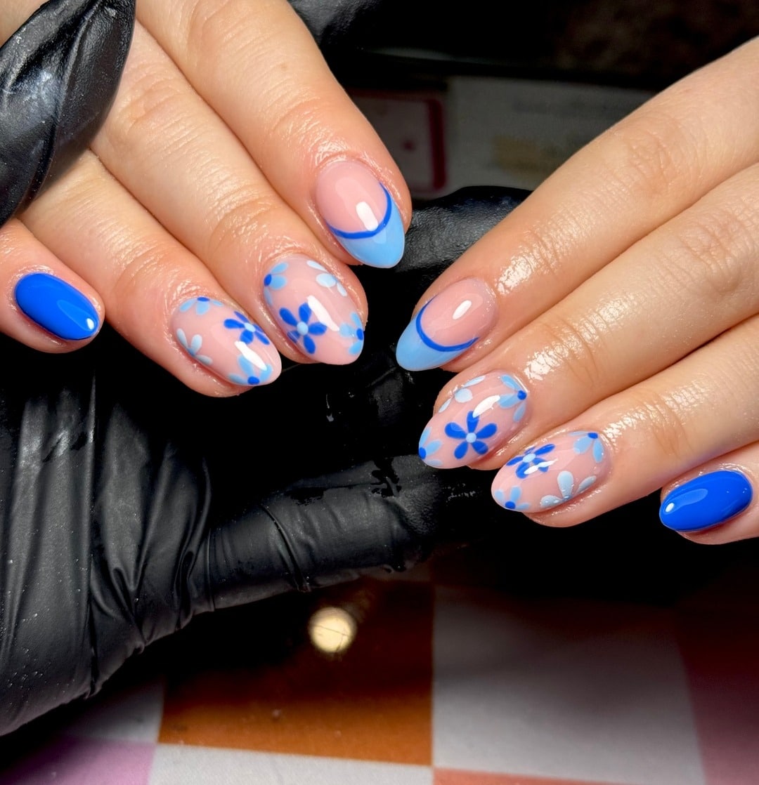 3. Bright Blue Mix & Match - blue floral nail ideas