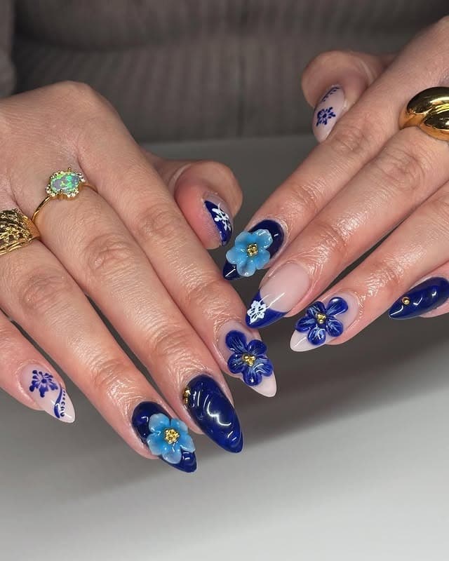 8. 3D Blue Floral Glam - blue floral nail ideas