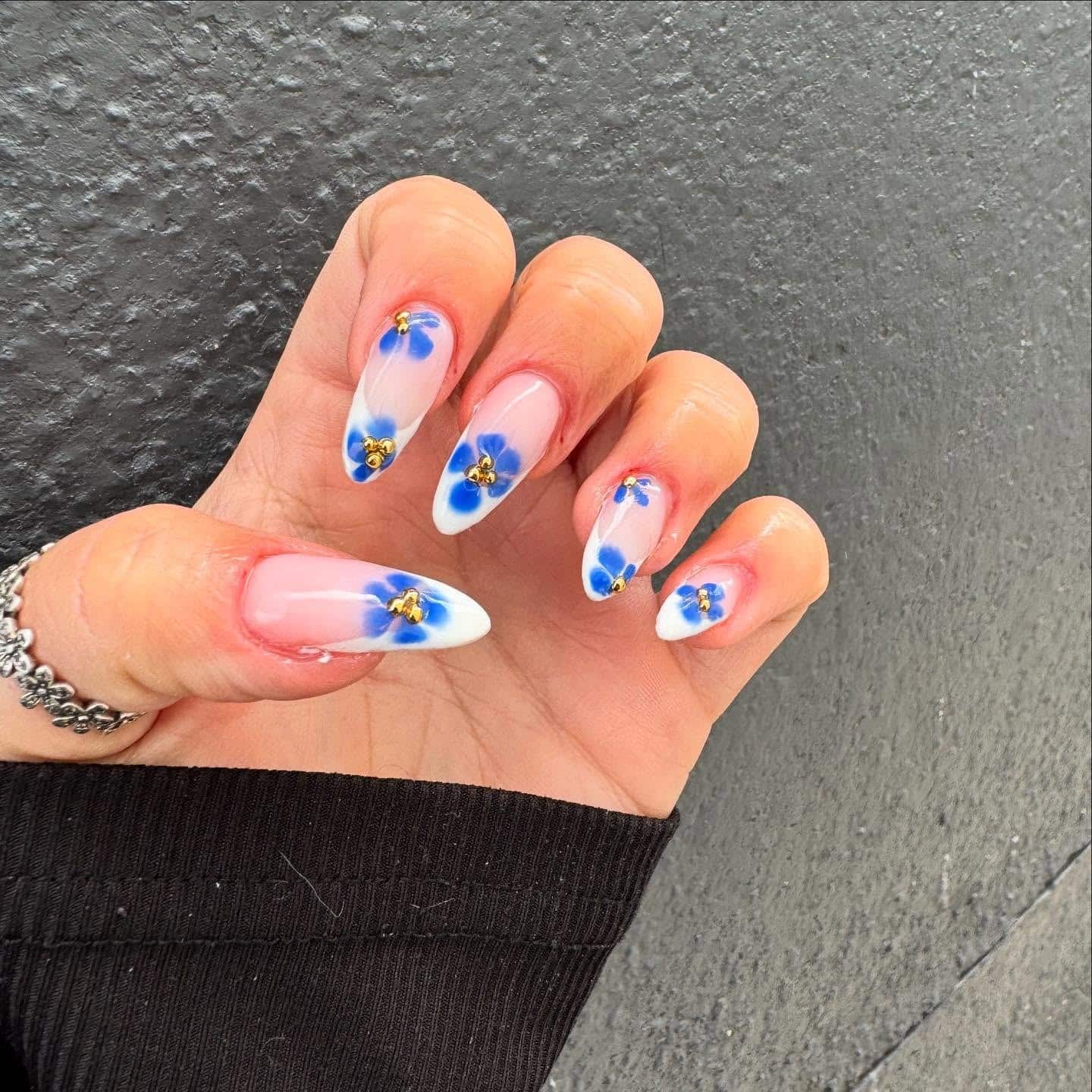 12. White-Tipped Blue Blossom Nails - blue floral nail ideas