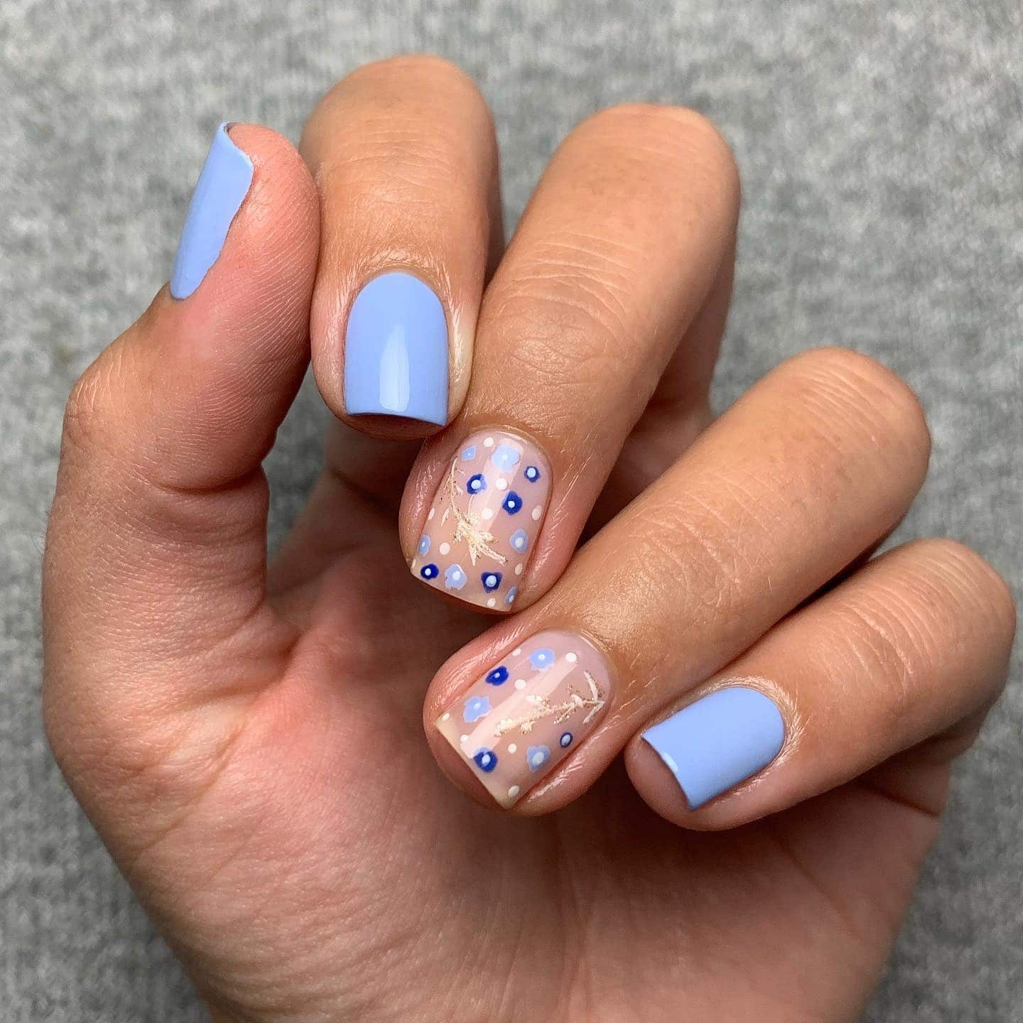 14. Pastel Blue Accents with Gold - blue floral nail ideas