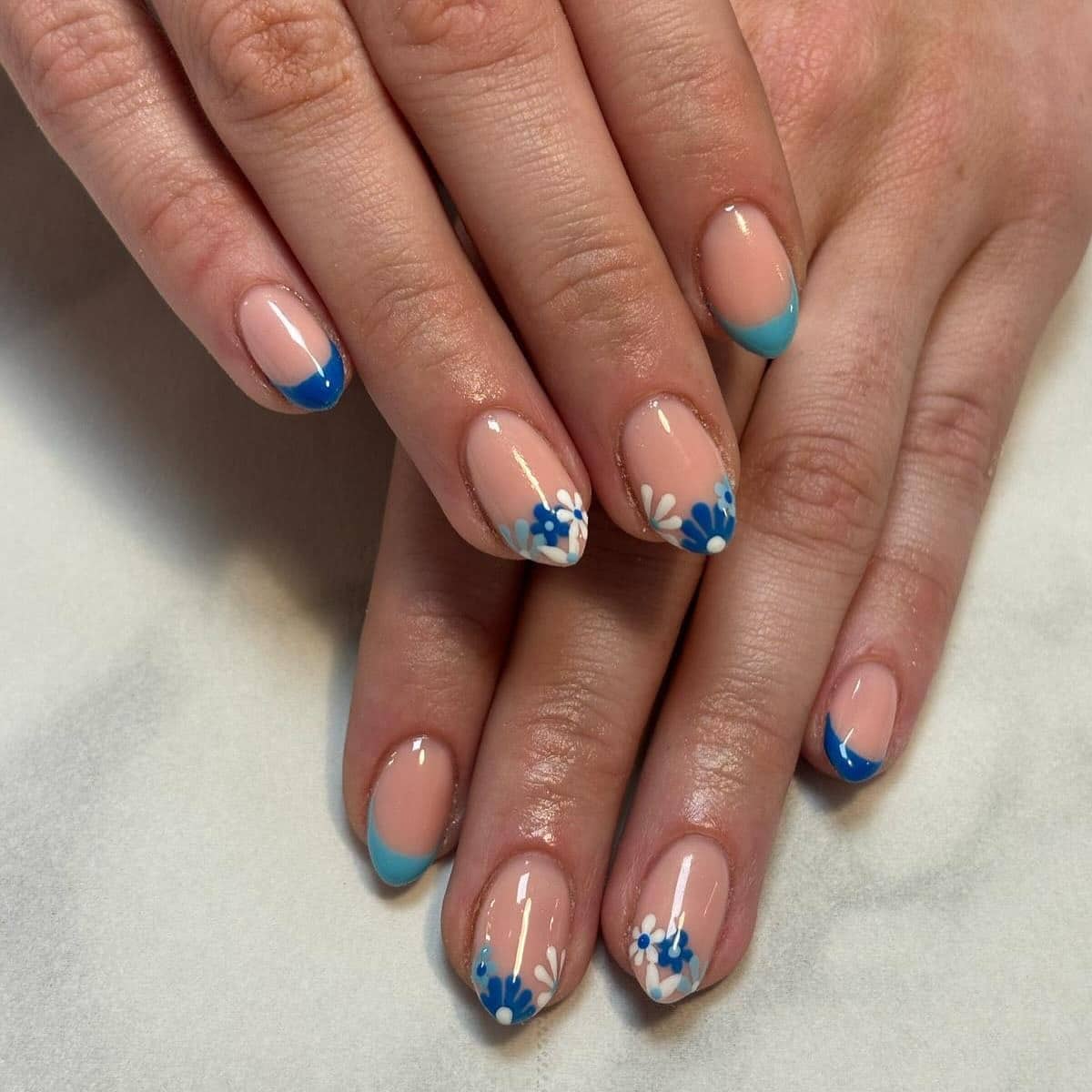 20. Blue French with Daisy Accents - blue floral nail ideas