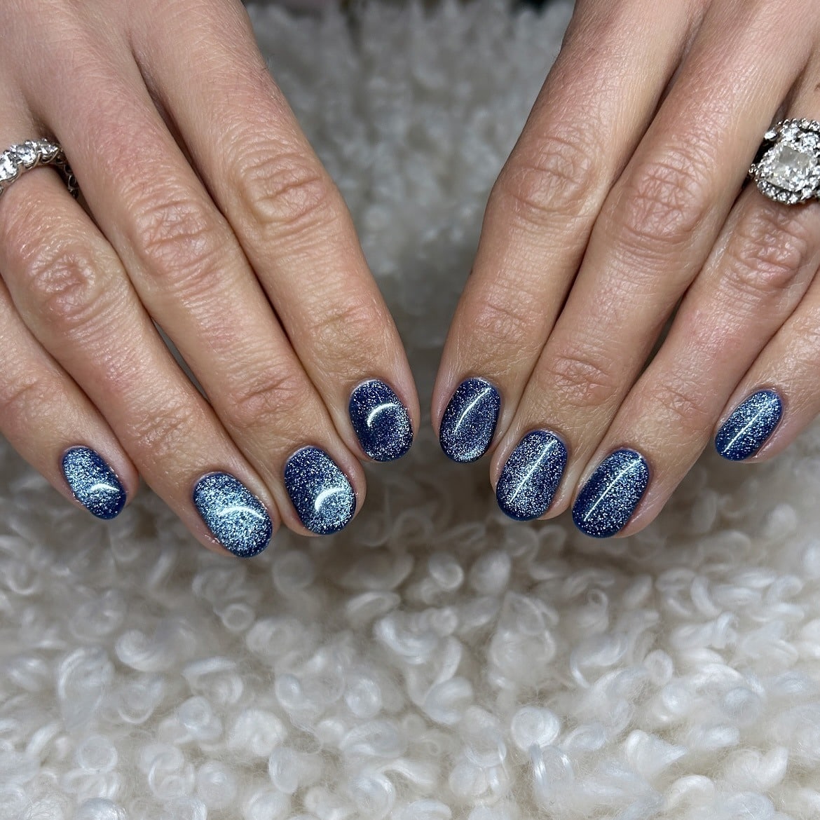 9. Celestial Glitter Nails - blue glitter nail ideas