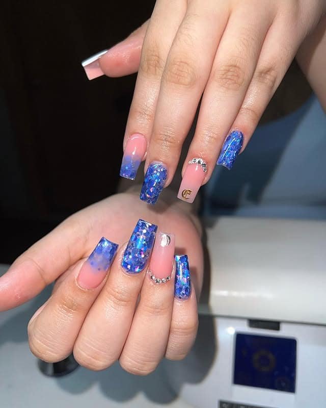 10. Glitter Fade with Gem Accents - blue glitter nail ideas