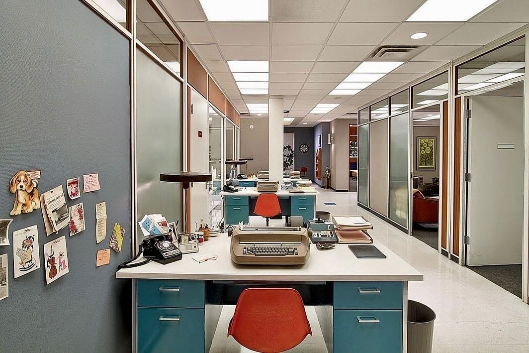 2. Mid-Century Corporate Charm in Teal and Orange - vintage office ideas