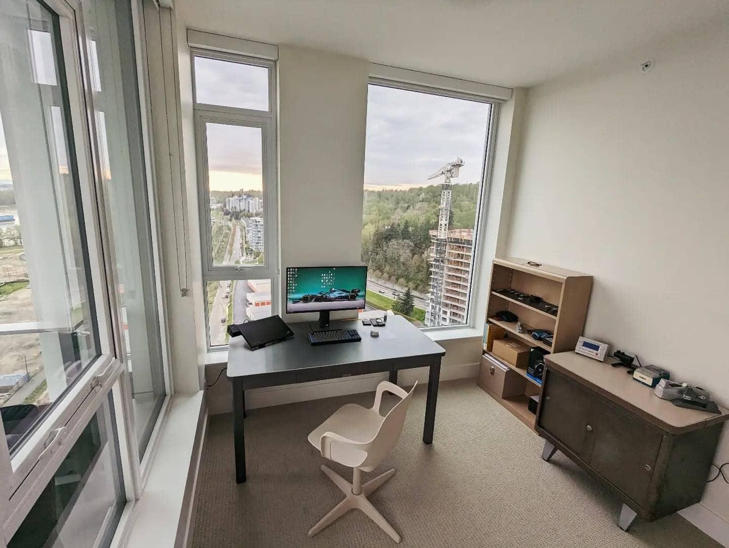 5. Minimalist High-Rise Study in Cool Gray - vintage office ideas