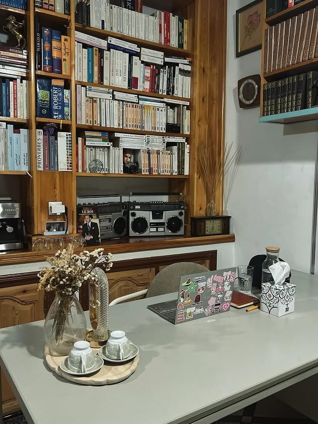 12. Library Office with Natural Wood and Retro Accents - vintage office ideas