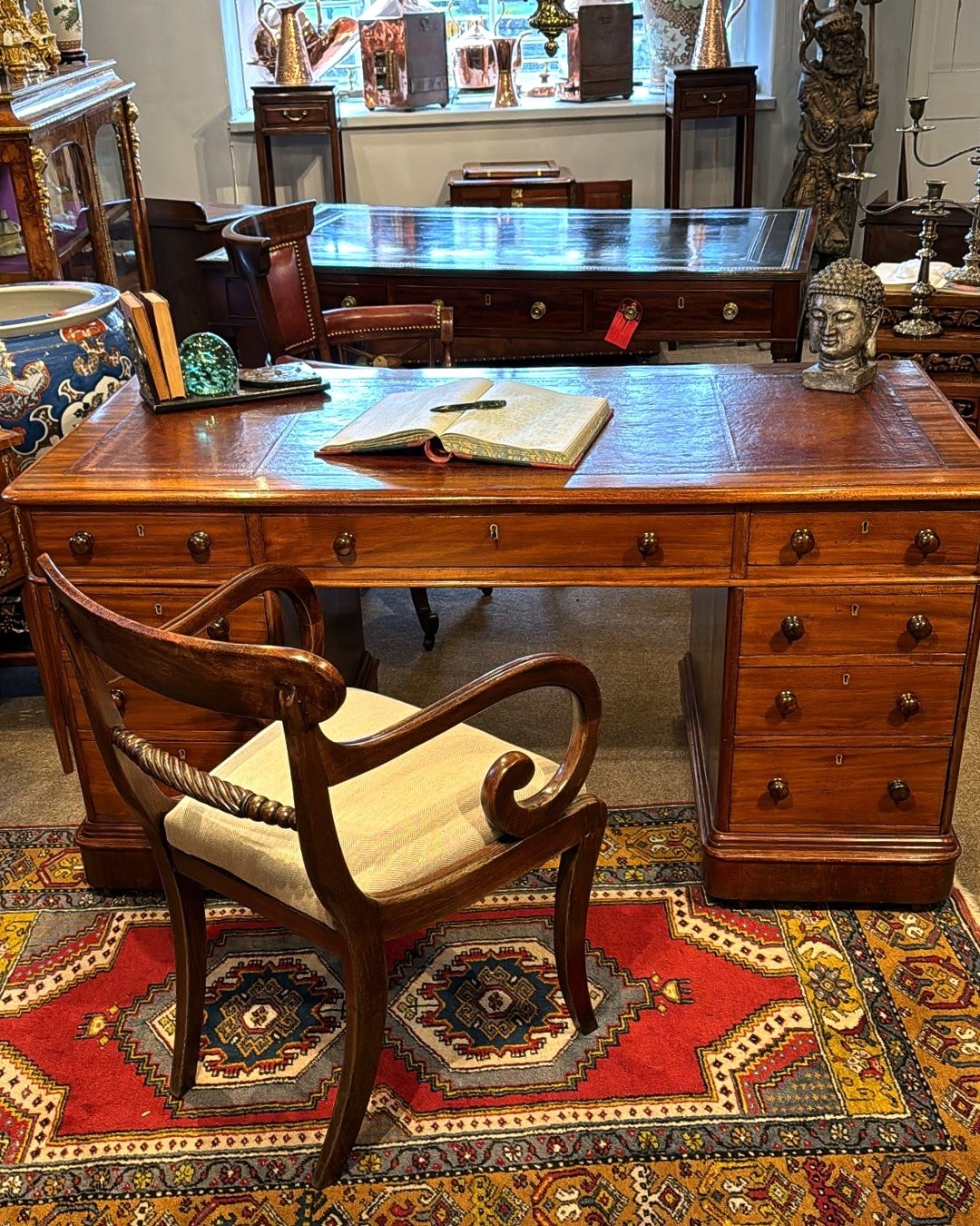 16. Antique Writing Desk with Rich Persian Rug - vintage office ideas