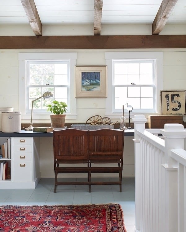 20. Farmhouse Loft Study with Red Accents - vintage office ideas