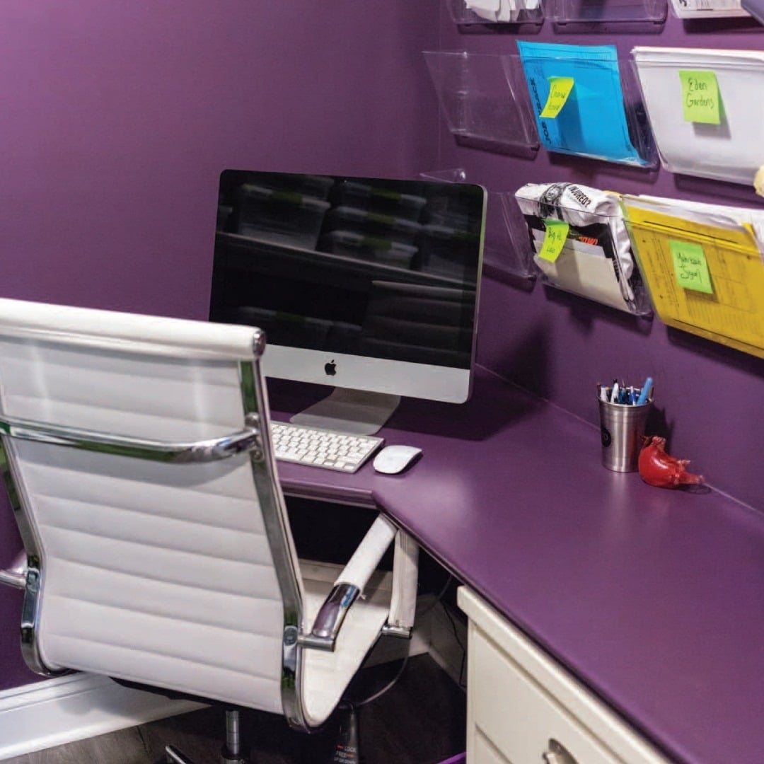 5. Sleek Eggplant Corner Office - purple office ideas