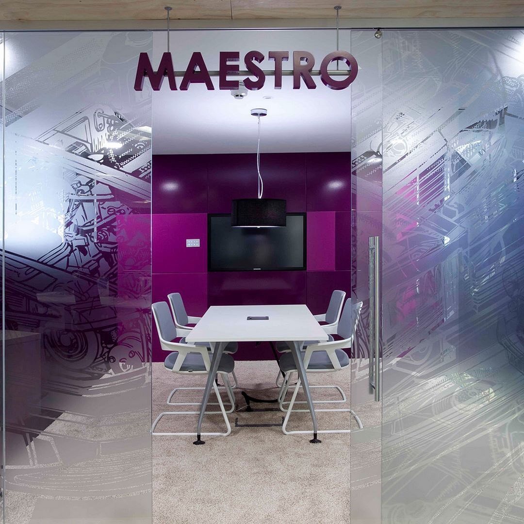20. Fuchsia Meeting Room with Gloss Panels - purple office ideas