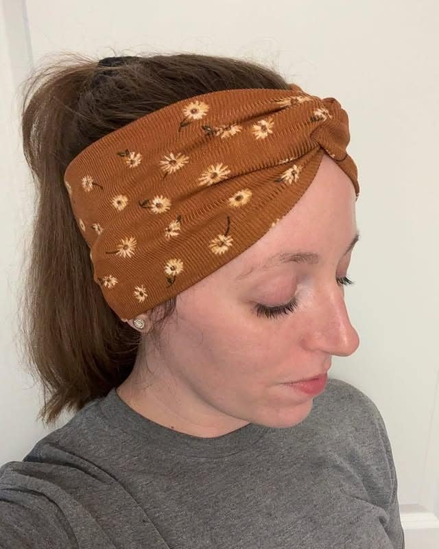 7. Auburn Pony with Rust Wrap - Headband Hairstyles