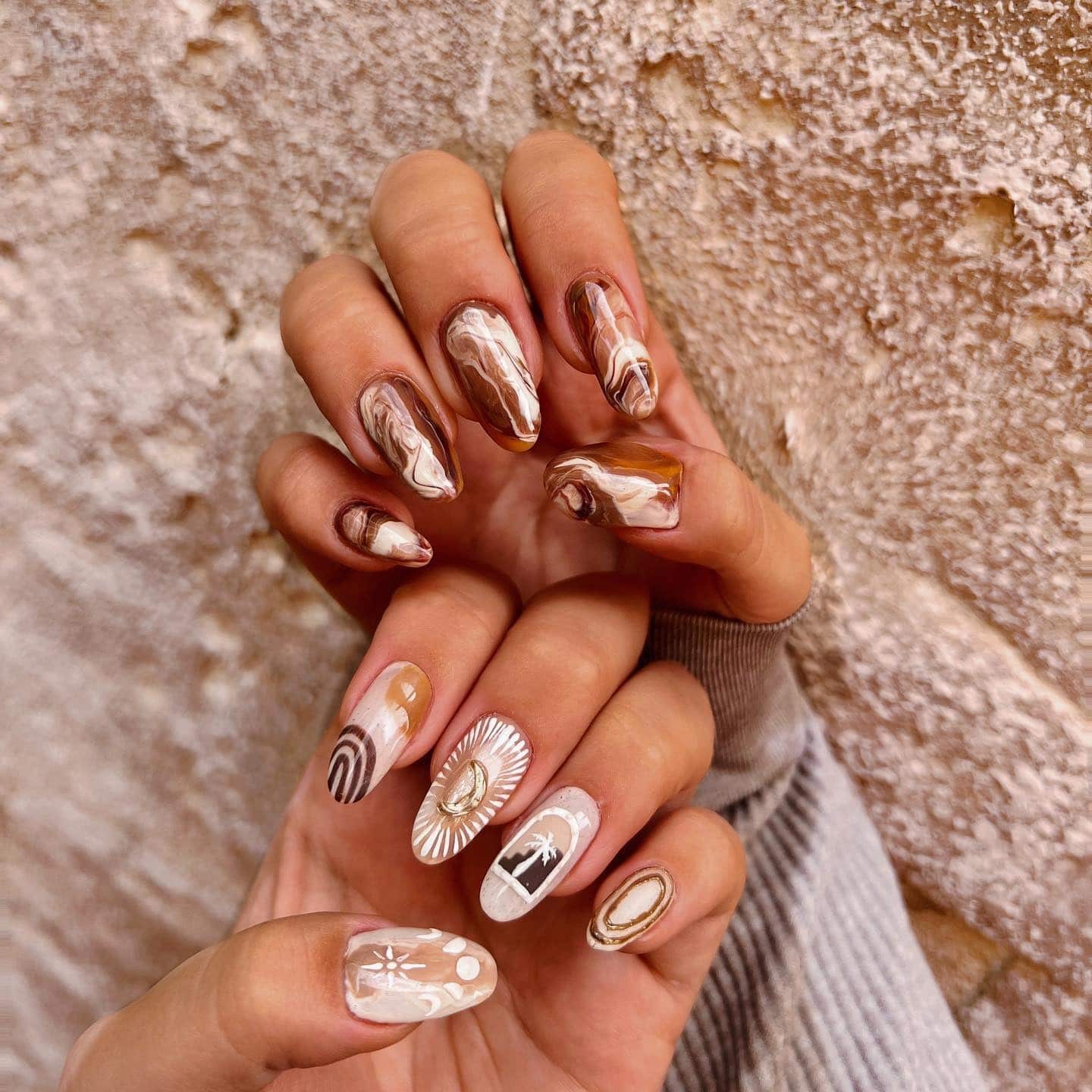 21. Desert Marbled Boho Nails - boho nail ideas