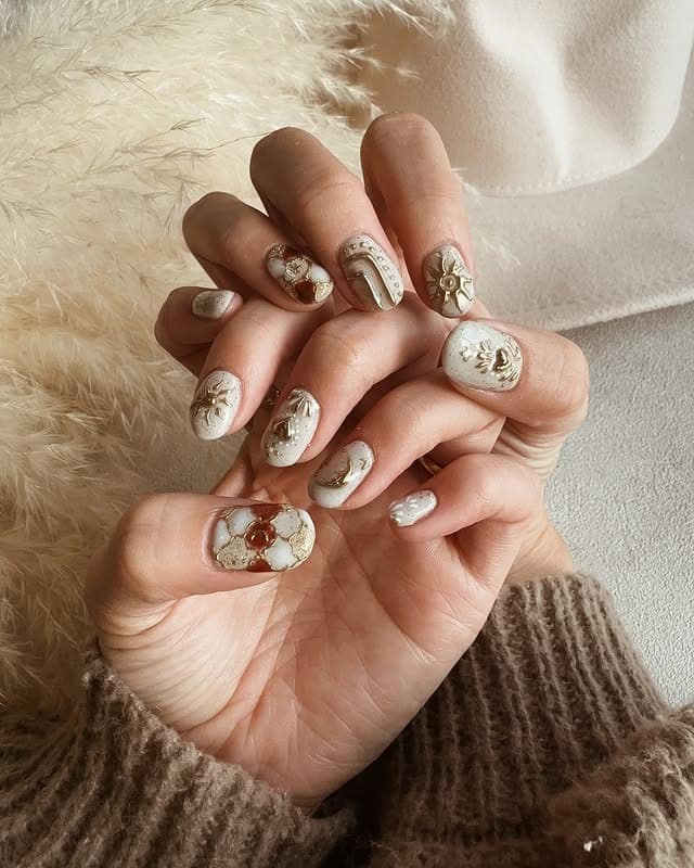 22. Gypsy Stonework with Golden Accents - boho nail ideas