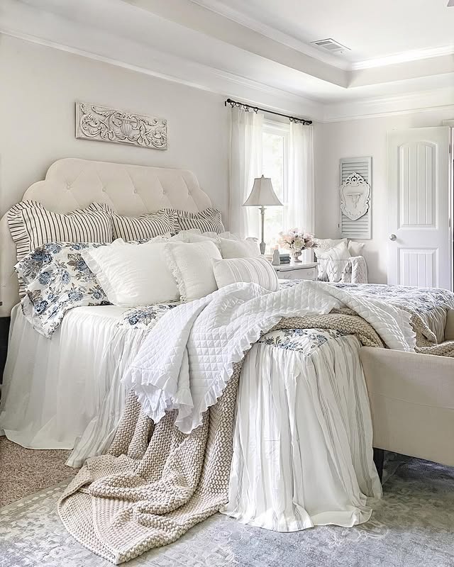 4. Cozy Whites with Floral Accents - french country bedroom ideas