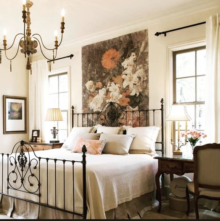 12. Iron Elegance with Floral Drama - french country bedroom ideas