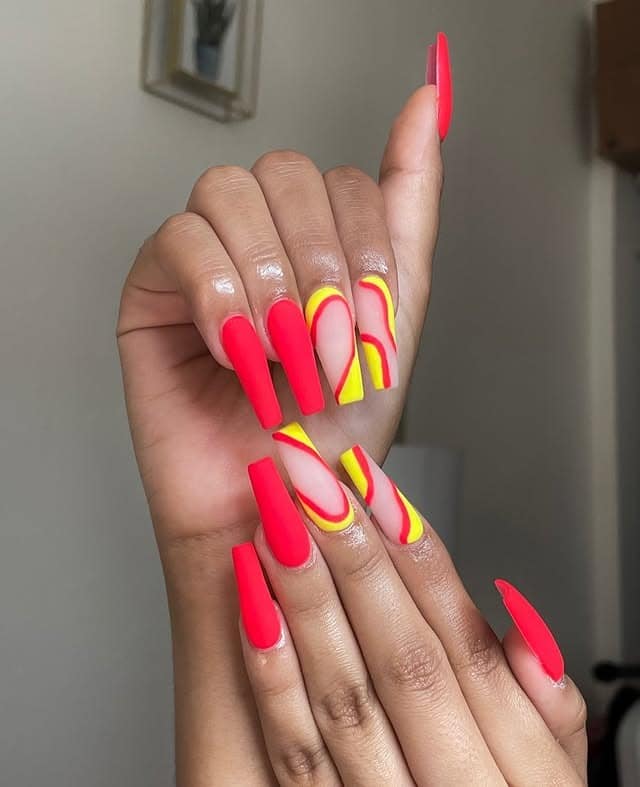 6. Red & Yellow Abstract Flames - bright color nail ideas