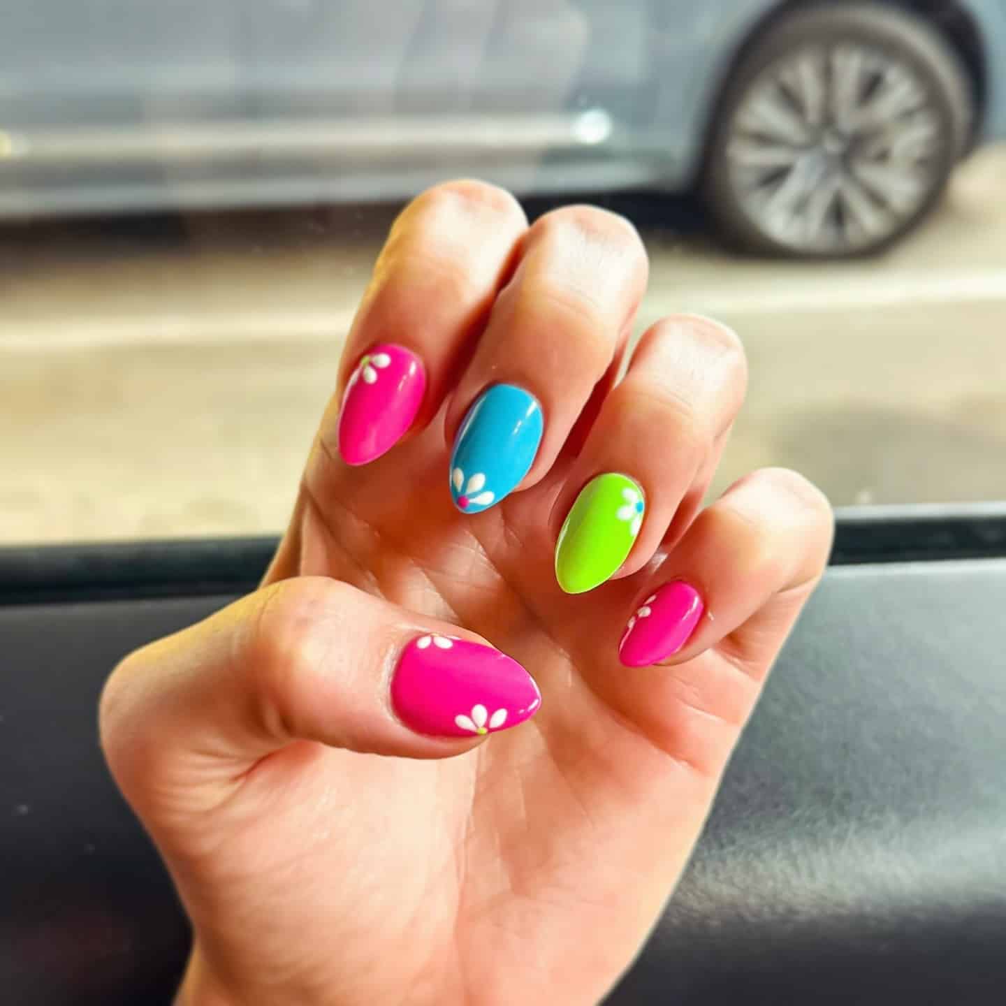 8. Bold Candy Florals - bright color nail ideas