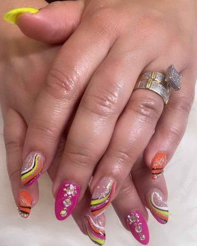 16. Glitter Swirls and Rhinestone Glam - bright color nail ideas