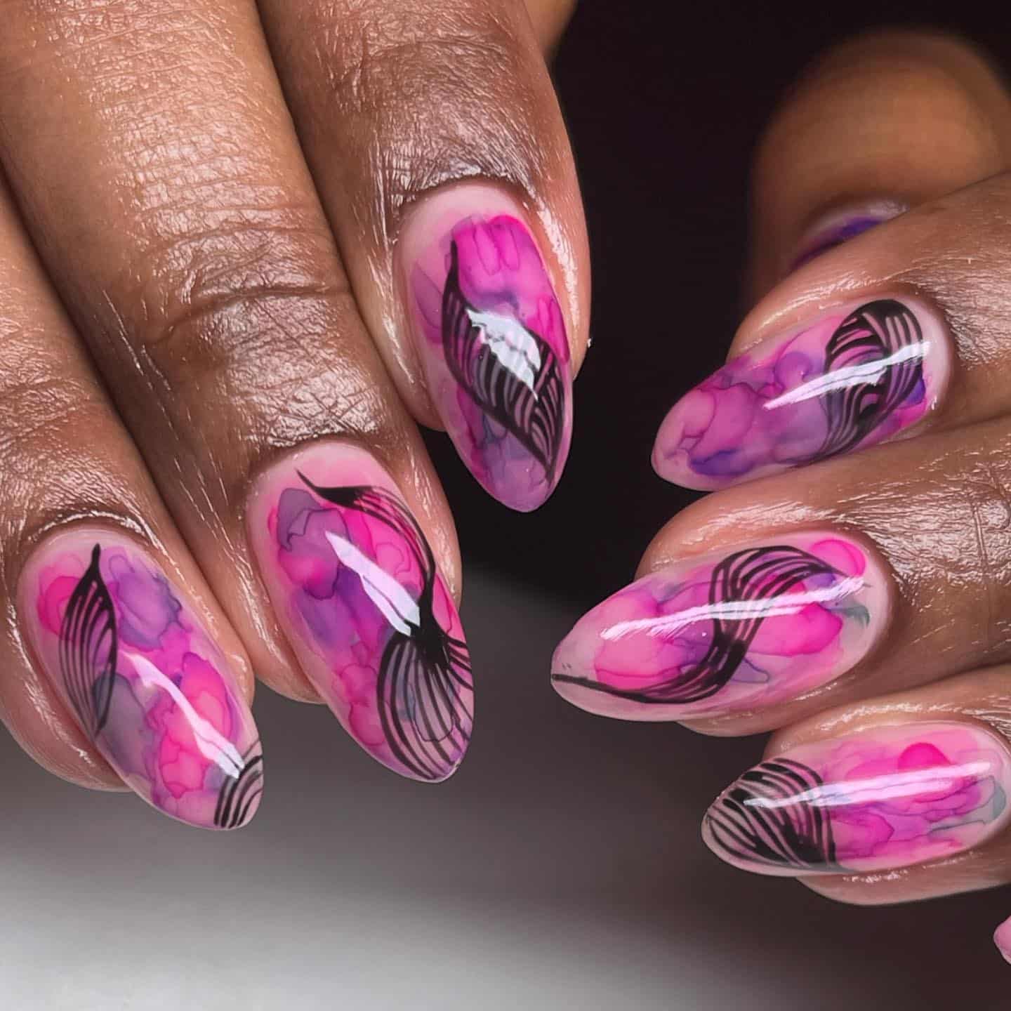 22. Watercolor Bloom with Black Detail - bright color nail ideas