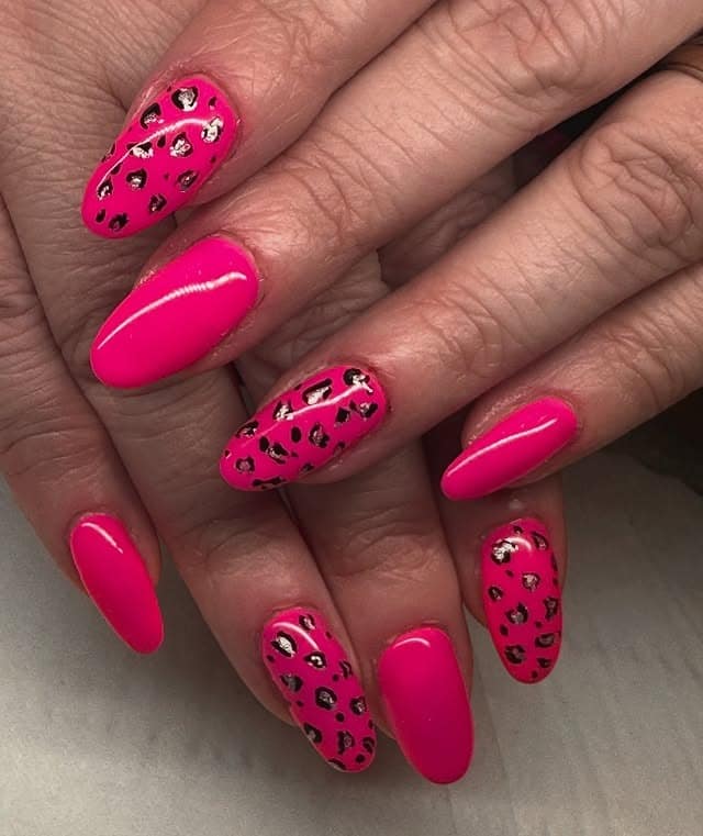 4. Pink Leopard Accent Nails - bright pink nail ideas