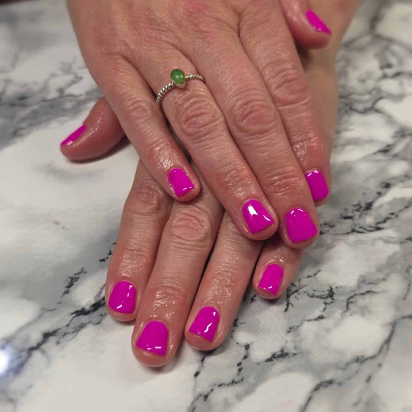 5. Glossy Pink Short Nails - bright pink nail ideas