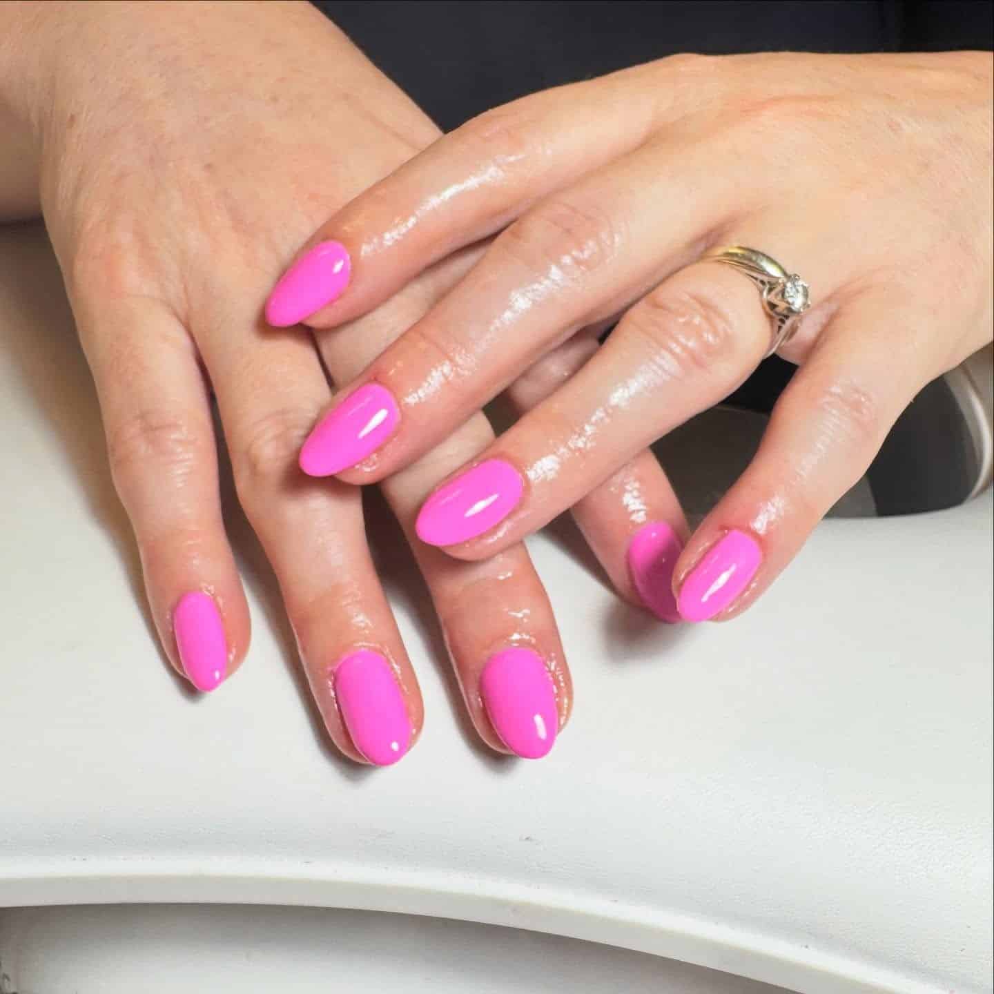 12. Shiny Pink Oval Nails - bright pink nail ideas