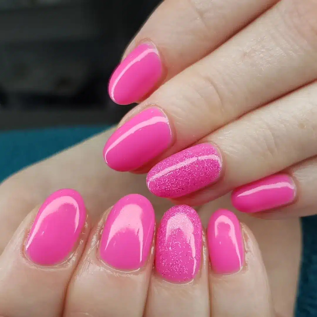 14. Pink Glitter Accent Nails - bright pink nail ideas