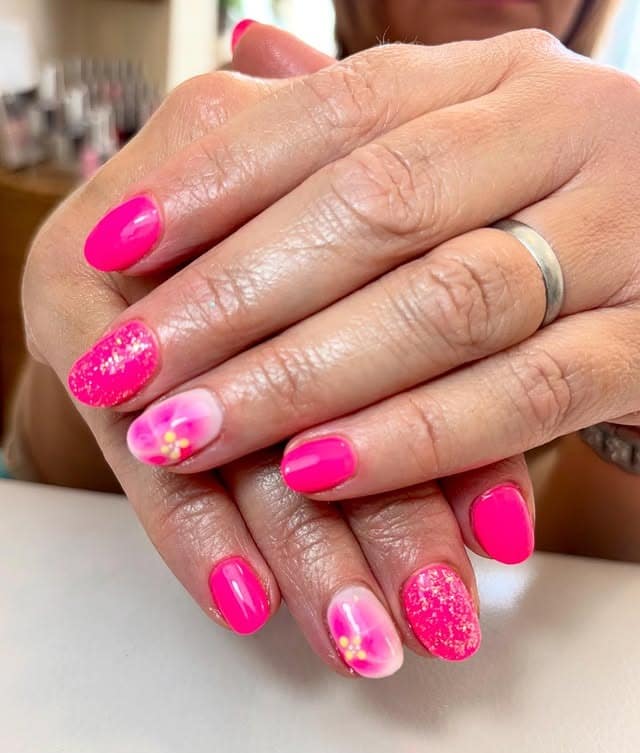 15. Pink Floral and Glitter Combo - bright pink nail ideas