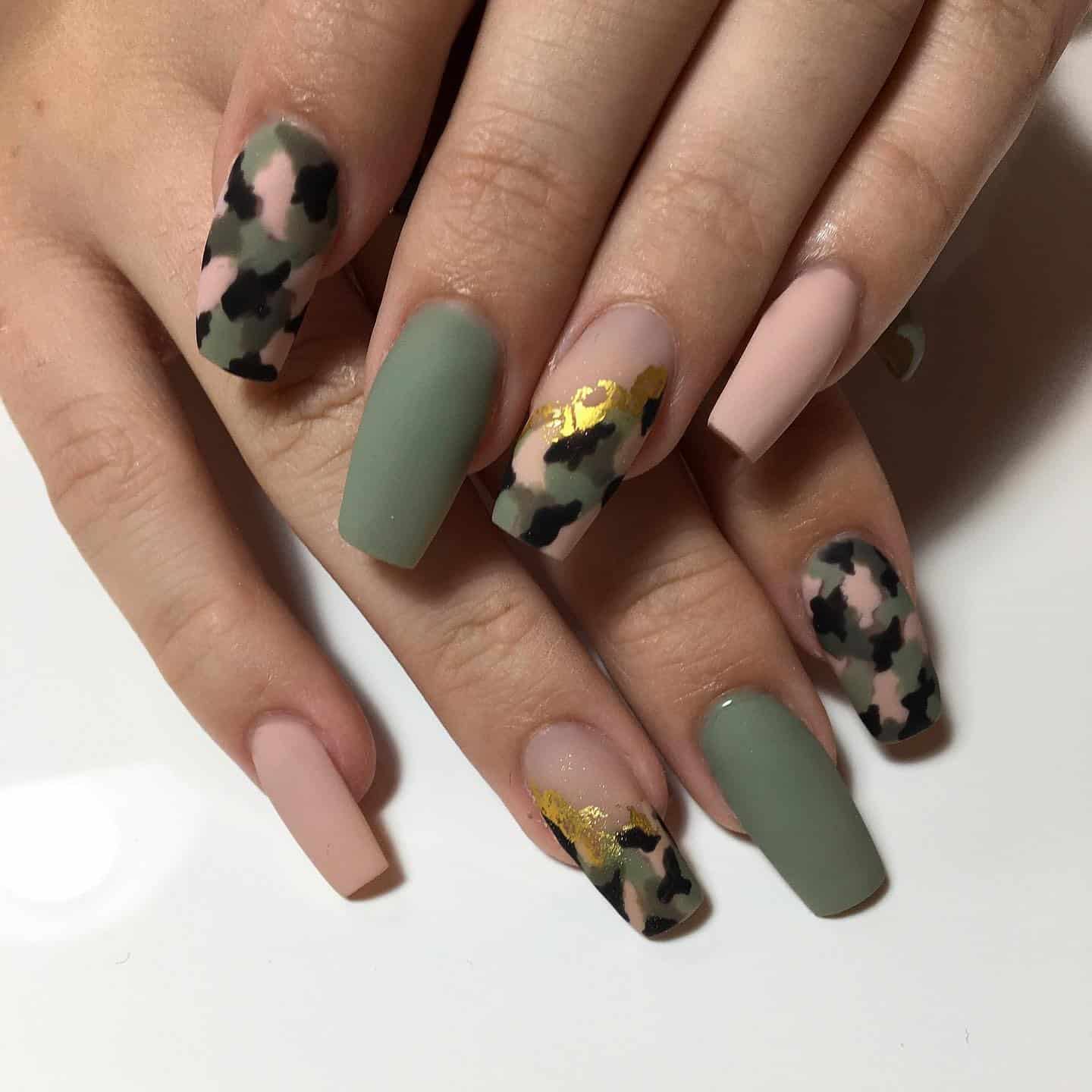 2. Soft Matte Camouflage with Gold Accents - camouflage nail ideas