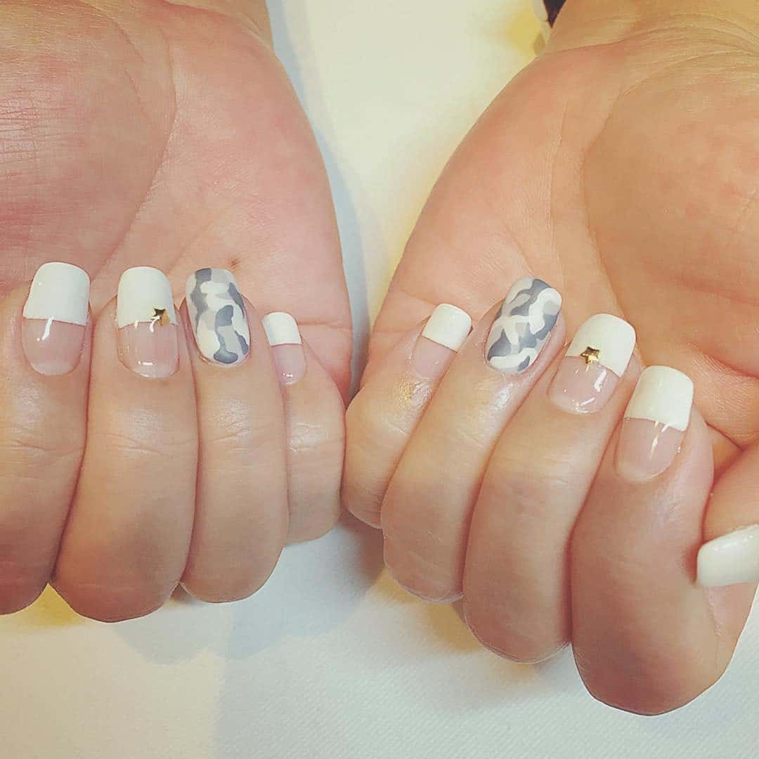 7. Subtle Camouflage French - camouflage nail ideas